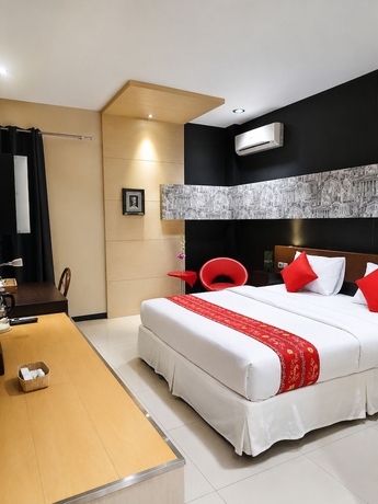 Imagen de la habitación del Hotel QUEEN CITY HOTEL. Foto 15