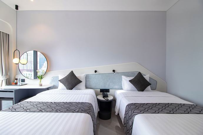 Imagen de la habitación del Hotel QUEENSLAND Bangkok. Foto 2