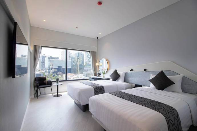 Imagen de la habitación del Hotel QUEENSLAND Bangkok. Foto 3