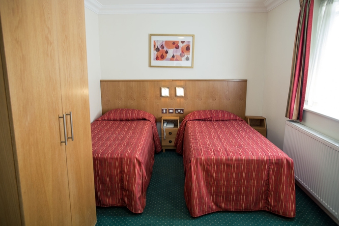 Imagen de la habitación del Hotel QUEENSWAY. Foto 5