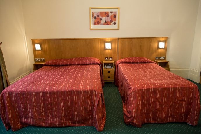 Imagen de la habitación del Hotel QUEENSWAY. Foto 7
