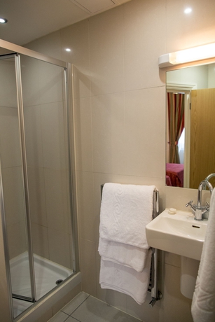 Imagen de la habitación del Hotel QUEENSWAY. Foto 9