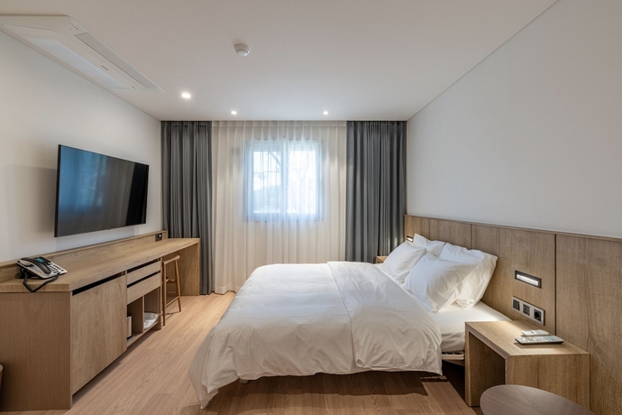 Imagen de la habitación del Hotel QVIST HOTEL. Foto 9