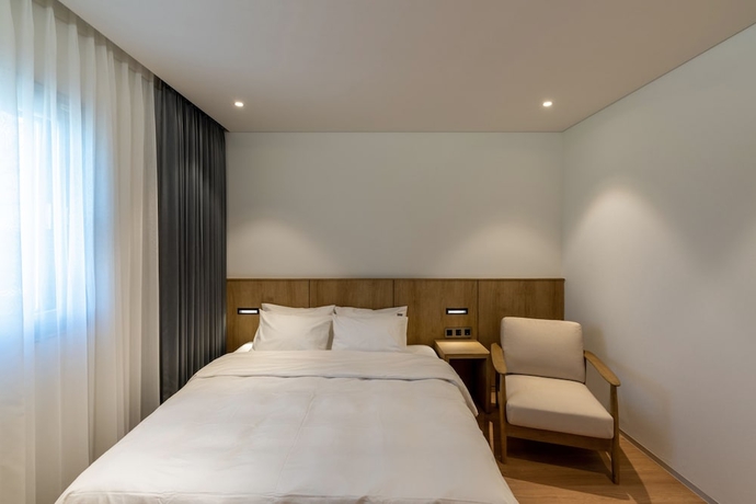 Imagen de la habitación del Hotel QVIST HOTEL. Foto 12