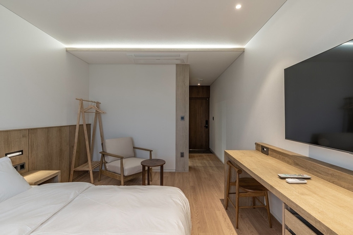 Imagen de la habitación del Hotel QVIST HOTEL. Foto 13