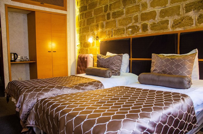 Imagen de la habitación del Hotel Qala. Foto 10