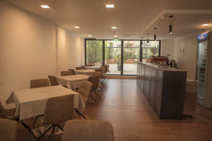 Imagen del bar/restaurante del Hotel Qama. Foto 4