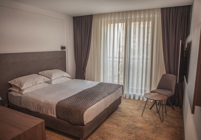 Imagen de la habitación del Hotel Qama. Foto 11