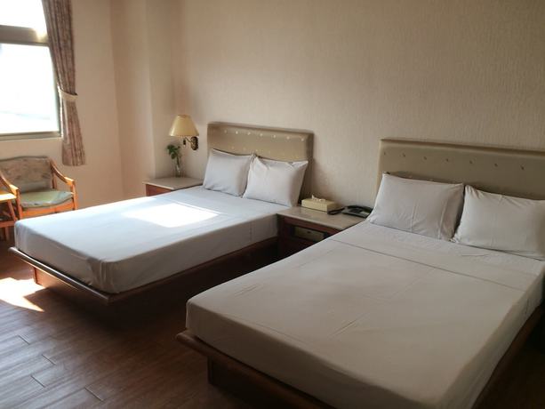 Imagen de la habitación del Hotel Qan Shuo. Foto 4