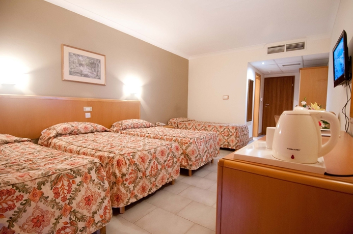 Imagen de la habitación del Hotel Qawra Palace Resort and Spa. Foto 6