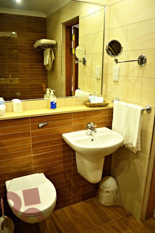 Imagen de la habitación del Hotel Qawra Palace Resort and Spa. Foto 9