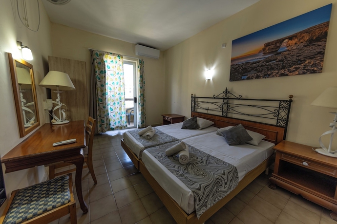Imagen de la habitación del Hotel Qawra Point Holiday Complex. Foto 4