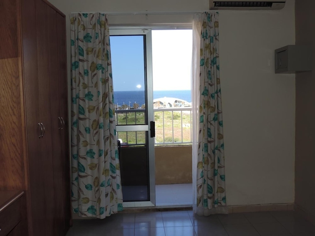 Imagen de la habitación del Hotel Qawra Point Holiday Complex. Foto 10