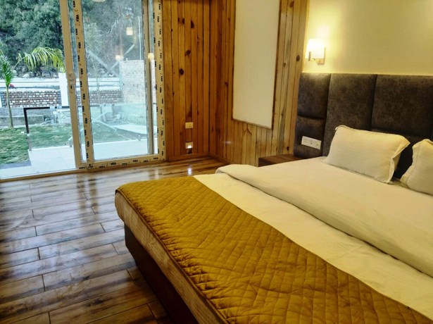 Imagen de la habitación del Hotel Qcent Woods Spa and Resort. Foto 2