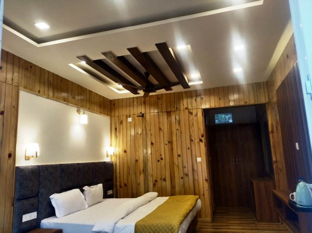 Imagen de la habitación del Hotel Qcent Woods Spa and Resort. Foto 3