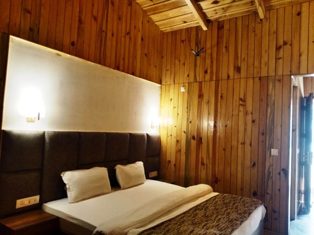 Imagen de la habitación del Hotel Qcent Woods Spa and Resort. Foto 7
