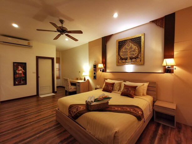 Imagen de la habitación del Hotel Qg Resort. Foto 17