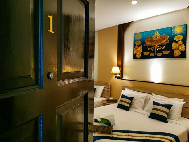 Imagen de la habitación del Hotel Qg Resort. Foto 25