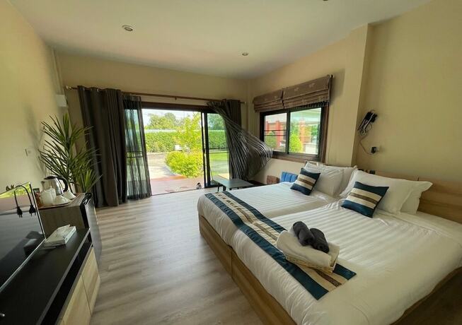 Imagen de la habitación del Hotel Qg Resort. Foto 26