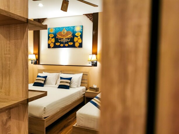 Imagen de la habitación del Hotel Qg Resort. Foto 30