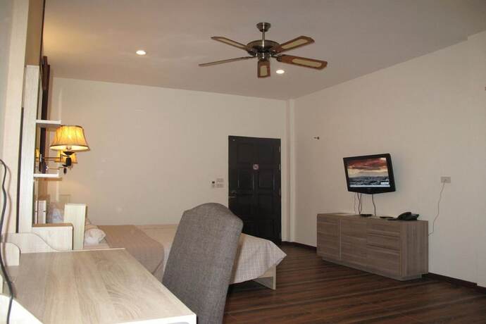 Imagen de la habitación del Hotel Qg Resort. Foto 31