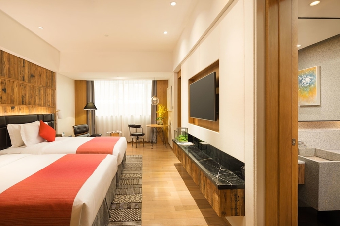 Imagen de la habitación del Hotel Qi. Foto 10