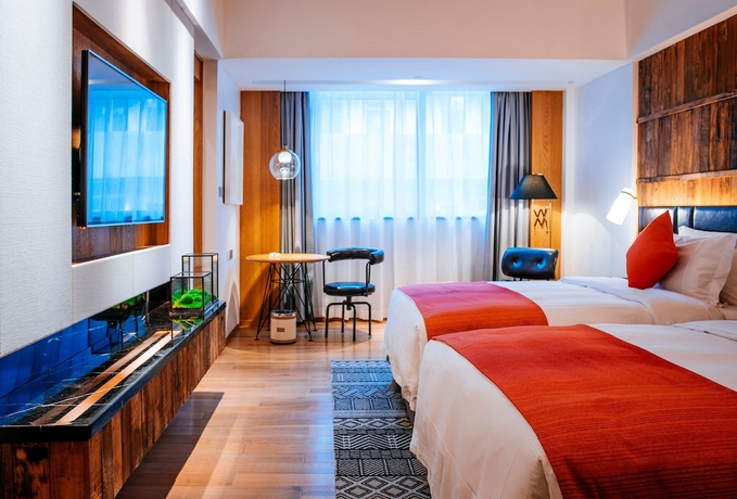 Imagen de la habitación del Hotel Qi. Foto 11