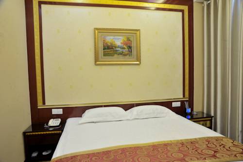 Imagen de la habitación del Hotel Qi Lian. Foto 3