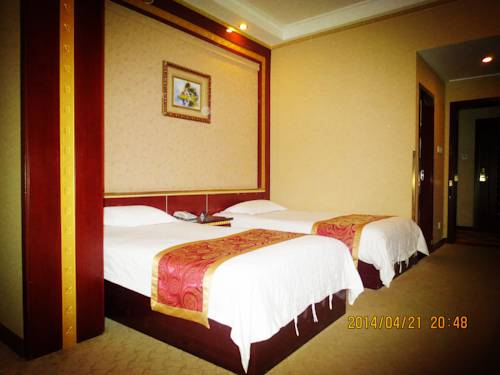 Imagen de la habitación del Hotel Qi Lian. Foto 7