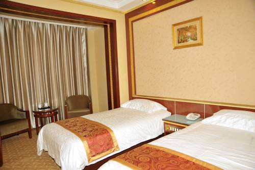 Imagen de la habitación del Hotel Qi Lian. Foto 8