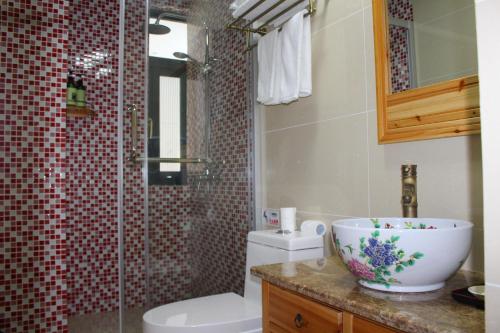 Imagen general del Hotel Qian Chen Homestay. Foto 5