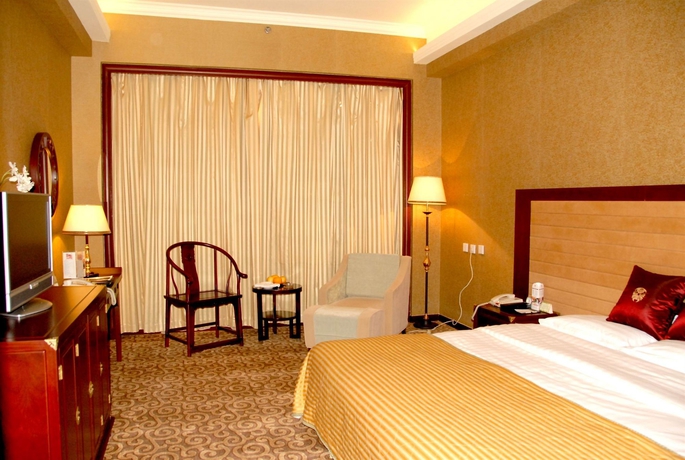 Imagen de la habitación del Hotel Qian Men Jian Guo. Foto 4