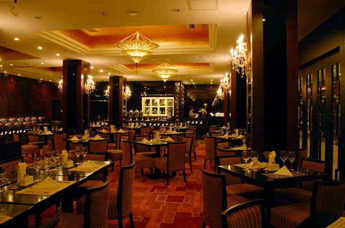 Imagen del bar/restaurante del Hotel Qian Men Jian Guo. Foto 2