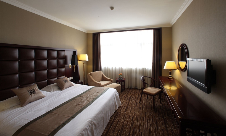 Imagen de la habitación del Hotel Qian Men Jian Guo. Foto 6