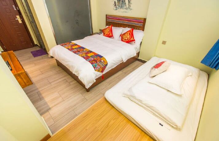 Imagen de la habitación del Hotel Qian Mo Inn. Foto 13