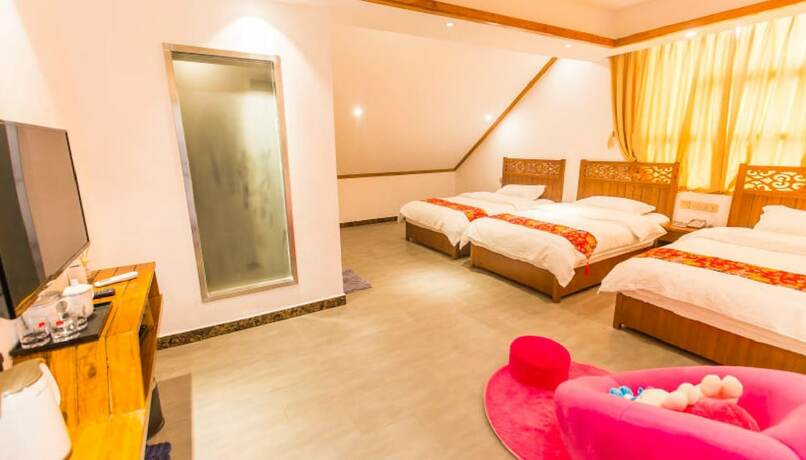 Imagen de la habitación del Hotel Qian Mo Inn. Foto 14