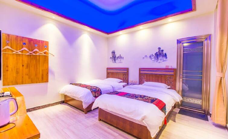 Imagen de la habitación del Hotel Qian Mo Inn. Foto 15