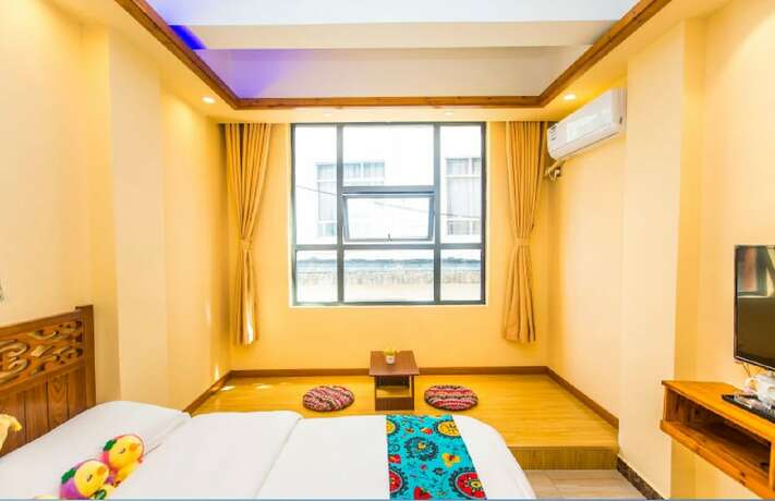Imagen de la habitación del Hotel Qian Mo Inn. Foto 16