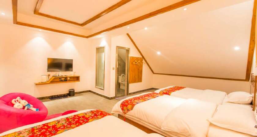 Imagen de la habitación del Hotel Qian Mo Inn. Foto 17