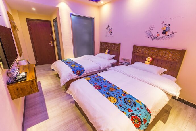 Imagen general del Hotel Qian Mo Inn. Foto 9
