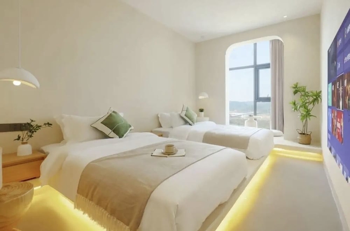 Imagen de la habitación del Hotel QianYue. Foto 2