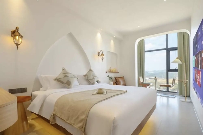 Imagen de la habitación del Hotel QianYue. Foto 8
