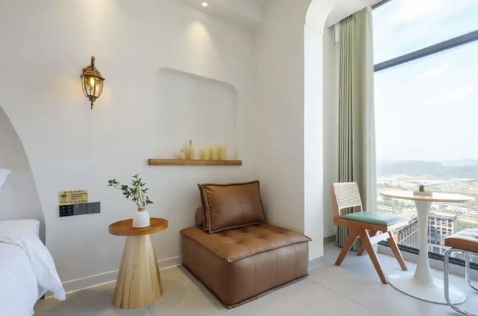 Imagen de la habitación del Hotel QianYue. Foto 11