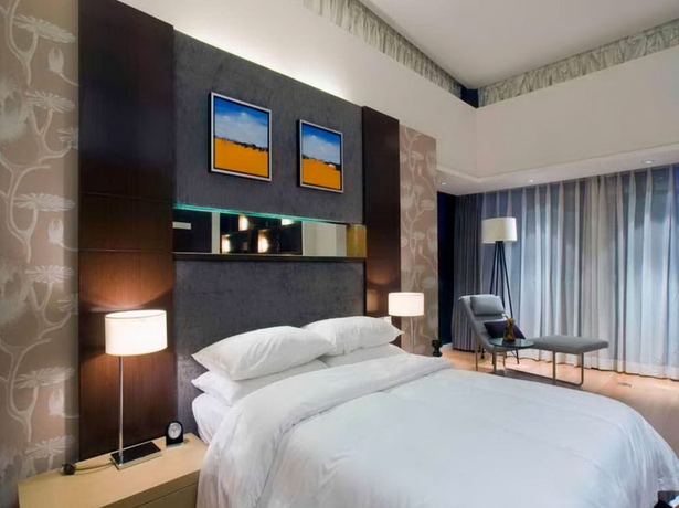 Imagen de la habitación del Hotel Qiandao Lake Country Club Resort. Foto 5