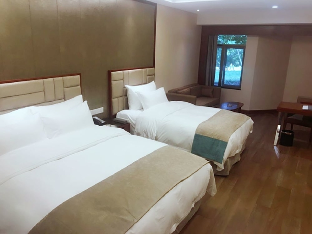 Imagen de la habitación del Hotel Qiandao Lake Country Club Resort. Foto 9