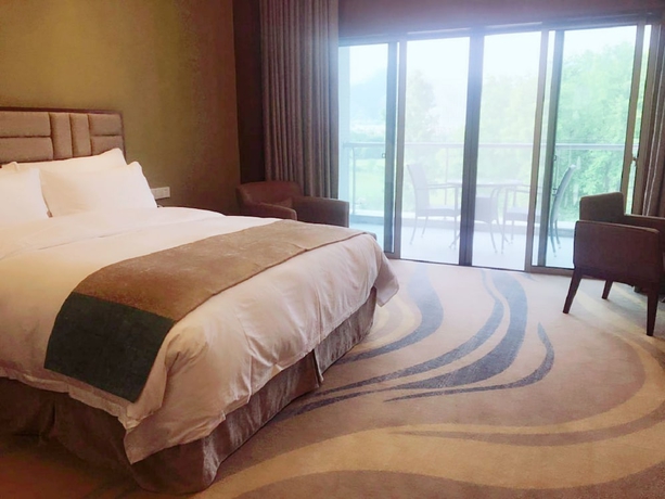 Imagen de la habitación del Hotel Qiandao Lake Country Club Resort. Foto 12