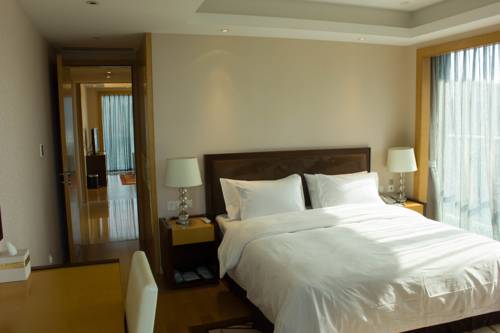 Imagen de la habitación del Hotel Qiandaohu Bandao Shiguang Apartment (lvcheng Dujia. Foto 6