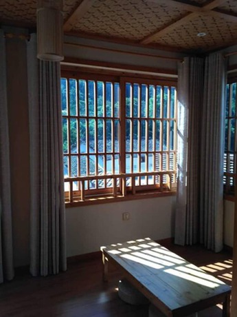 Imagen de la habitación del Hotel Qiandaohu Liyuan Village Botique Hotel. Foto 4