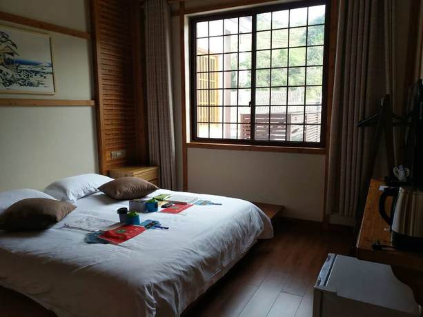 Imagen de la habitación del Hotel Qiandaohu Liyuan Village Botique Hotel. Foto 7