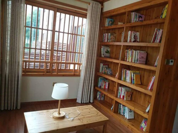 Imagen de la habitación del Hotel Qiandaohu Liyuan Village Botique Hotel. Foto 13